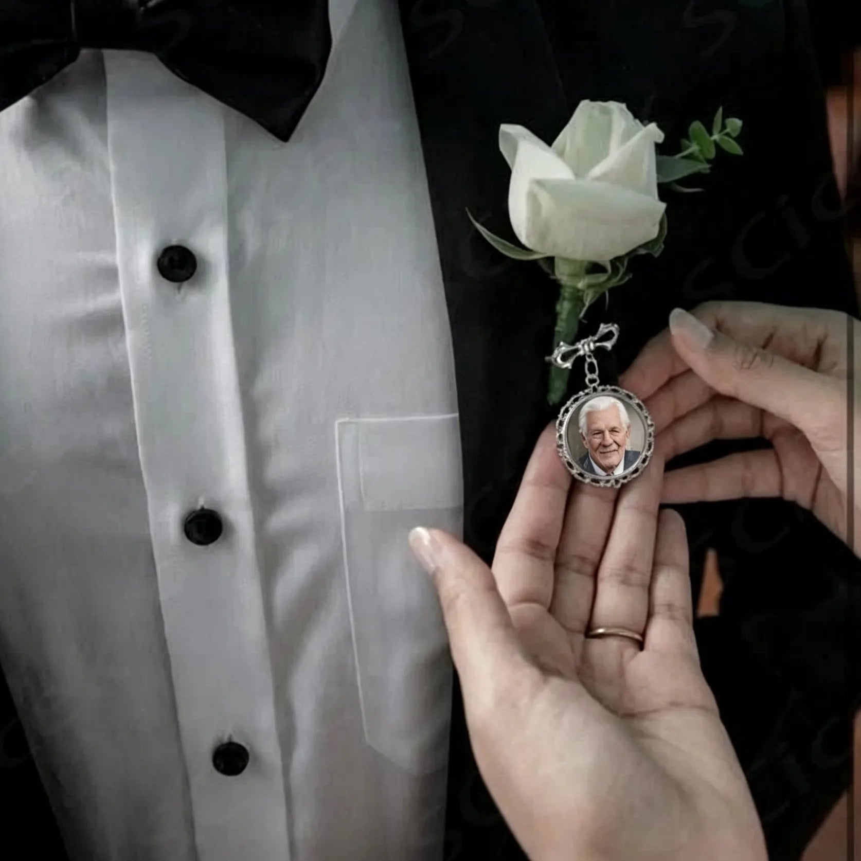 Personalized wedding memory brooch with custom photo charms on a white background.
