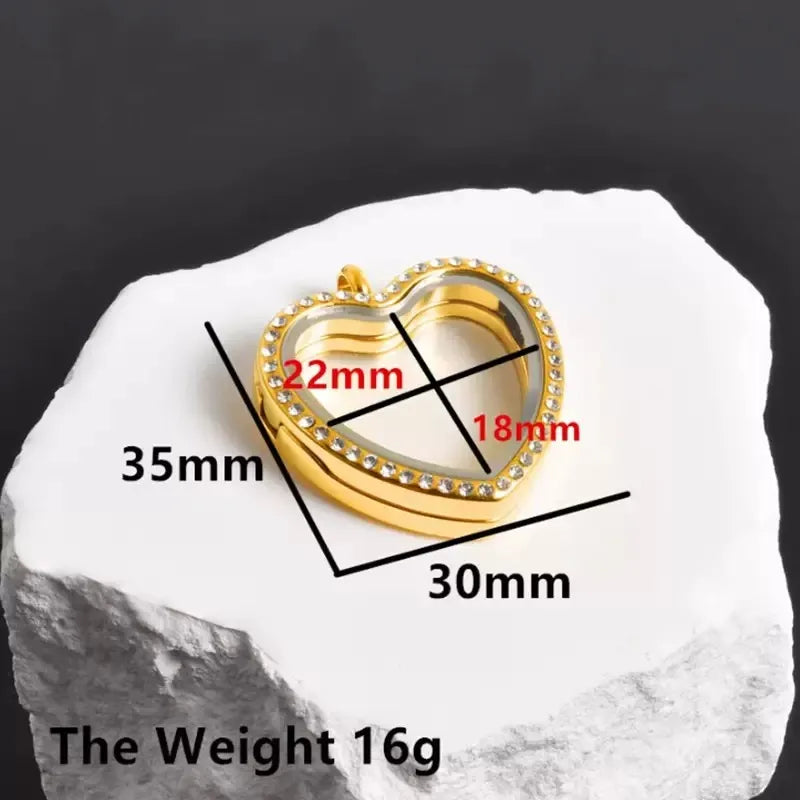 Gold heart photo pendant necklace with elegant metal frame detail.