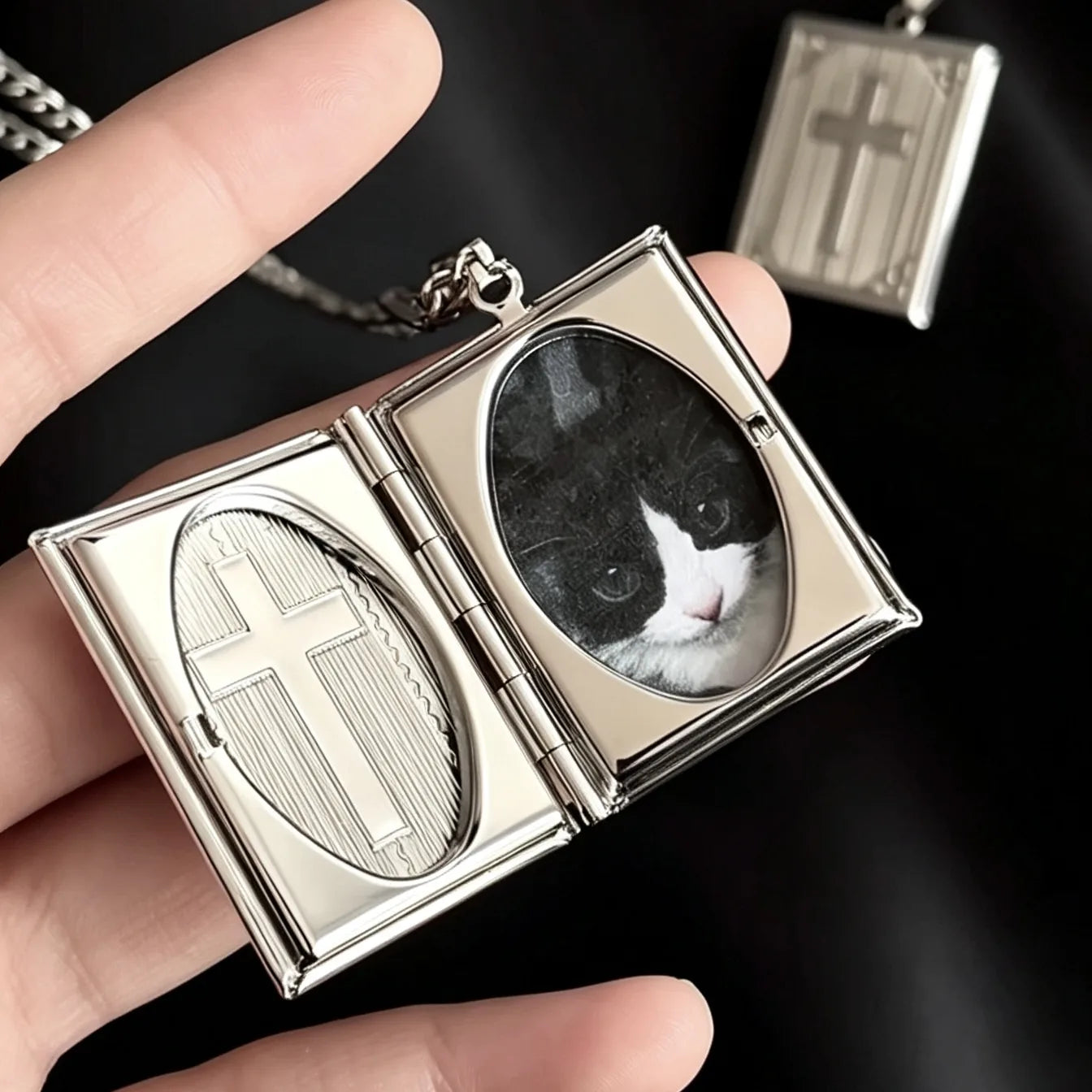 Open personalized cross locket showing custom photo inside