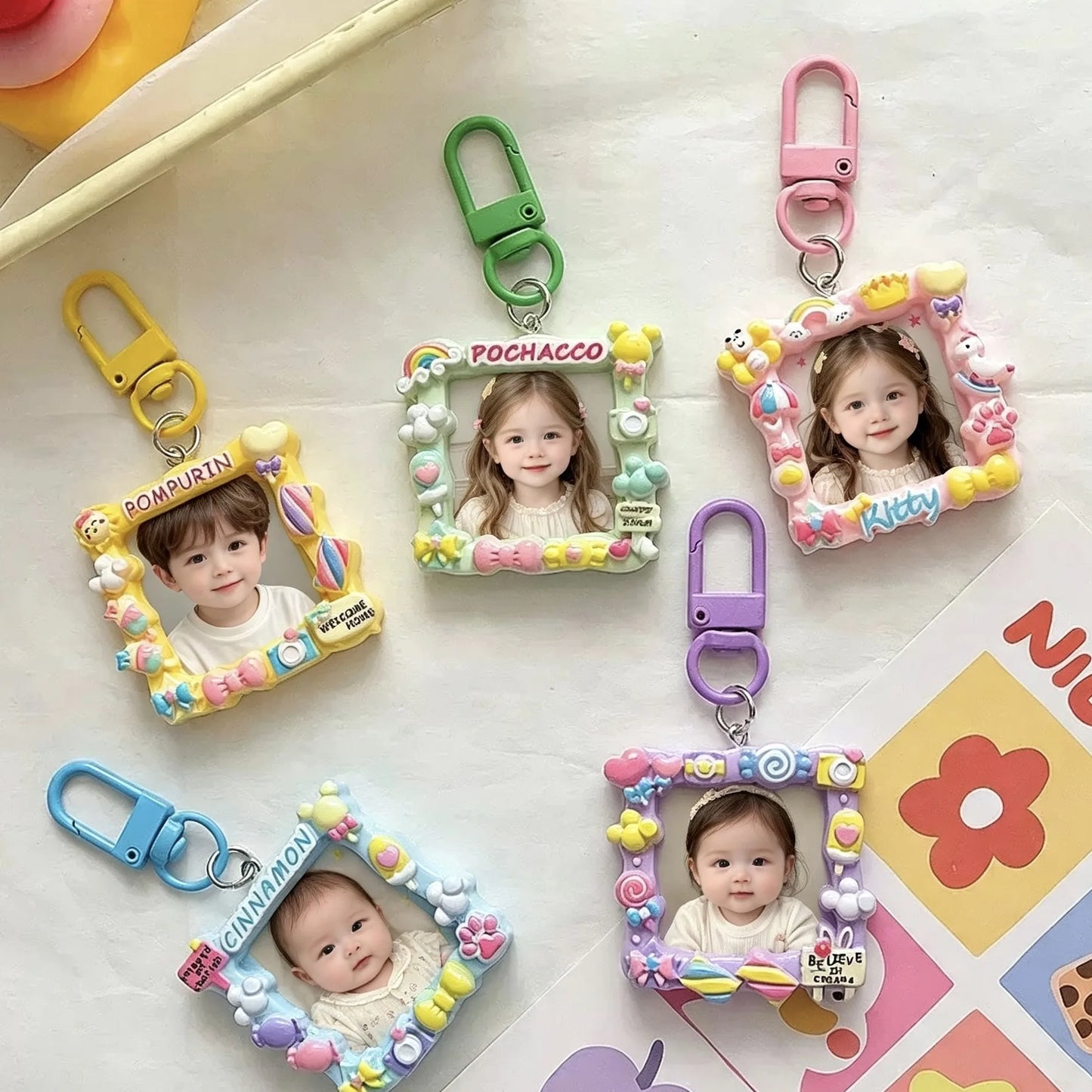 Personalized photo frame keychain with custom picture and name in a cute handmade-style resin frame.
