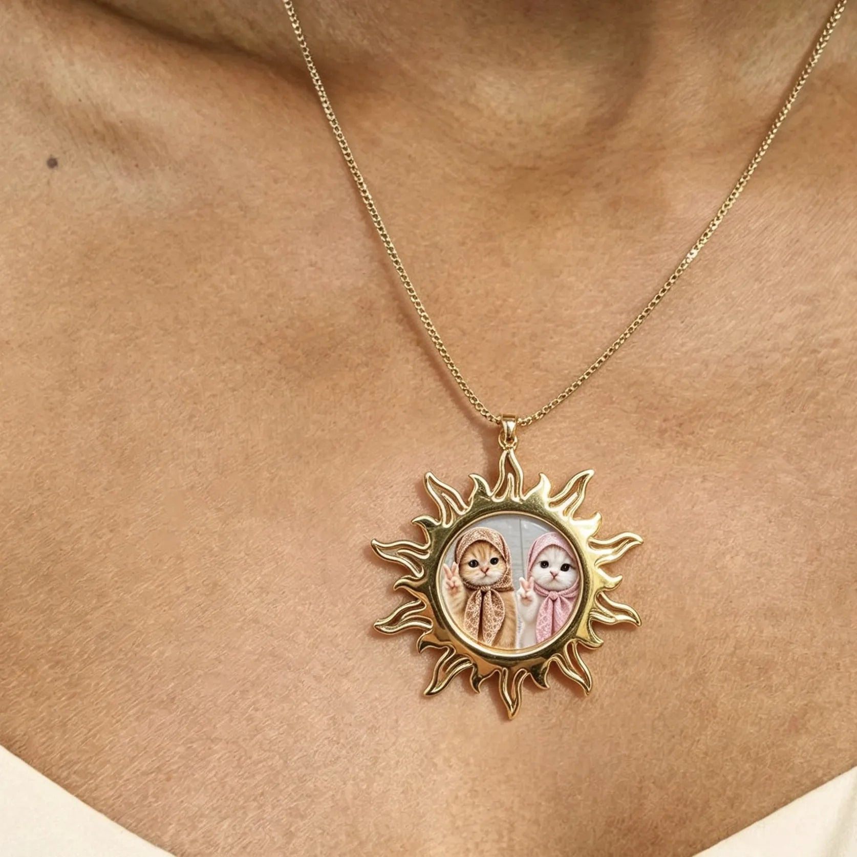 Woman wearing personalized gold sun photo necklace with custom picture pendant.